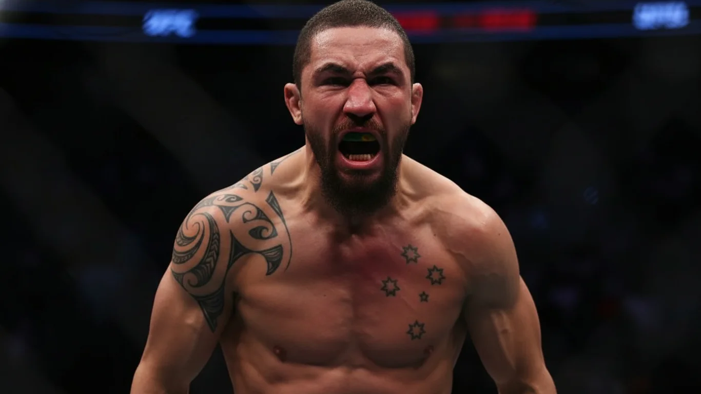 Mężczyzna z tatuażem na ramieniu krzyczy, okazując intensywne emocje. Stoi w oświetlonym ringu, w tle widać rozmyty napis "UFC".