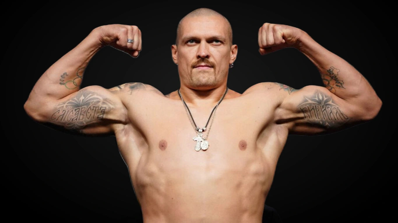 Ołeksandr Usyk w ringu, ukraiński niepokonany mistrz wagi ciężkiej w bokserskiej postawie mańkuta.